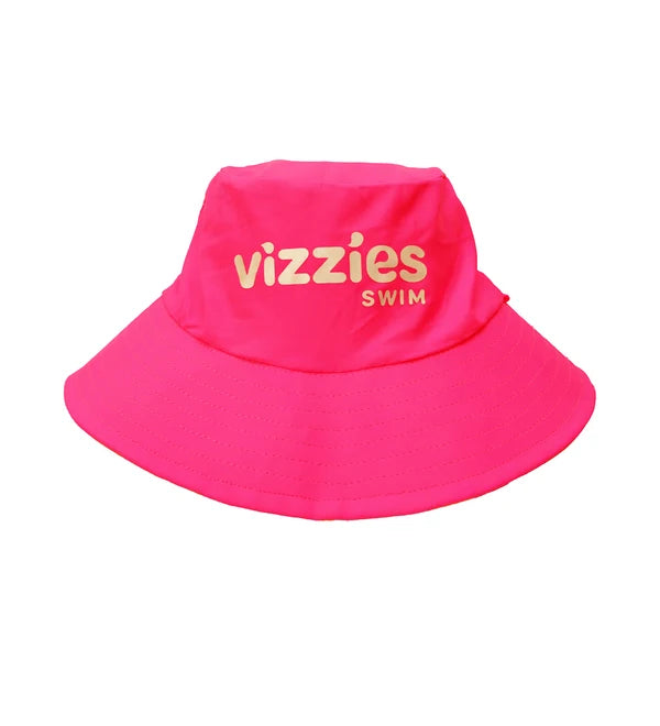 A bright pink bucket swim hat with 'vizzies SWIM' printed in yellow on the front, shown against a plain white background.