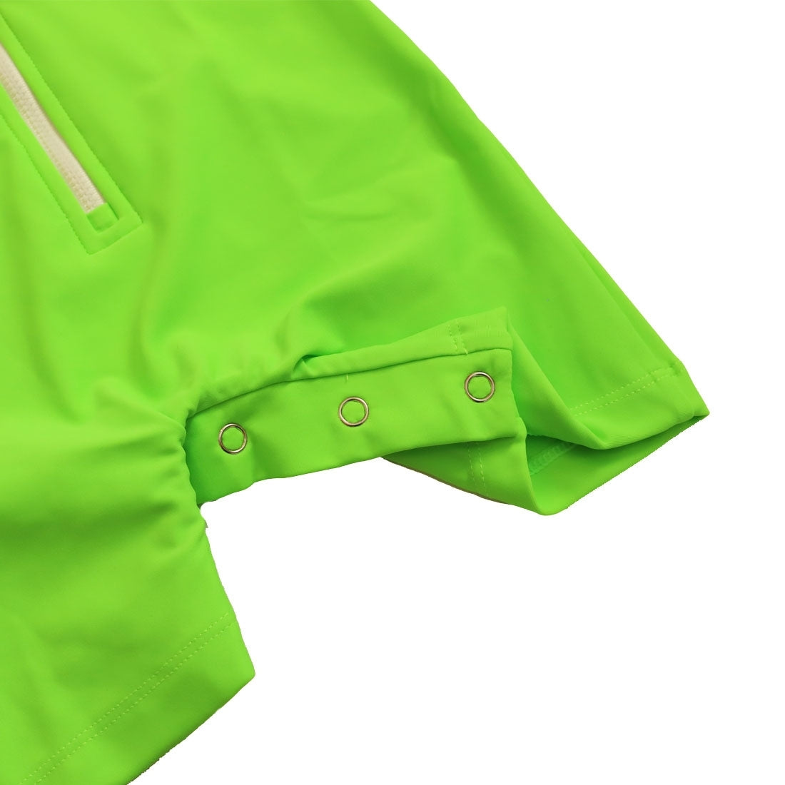 Bright green glow long-sleeve baby swimsuit from Vizzies Swim with a zipper front and crotch snaps, laid flat on a white background.